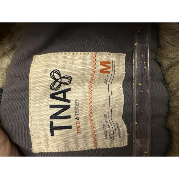 Aritzia TNA Platoon military utility jacket in grey with a faux-fur lined hood. - Picture 5 of 13